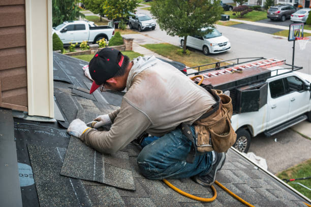 Professional Roofing technician working in Montgomery, TX